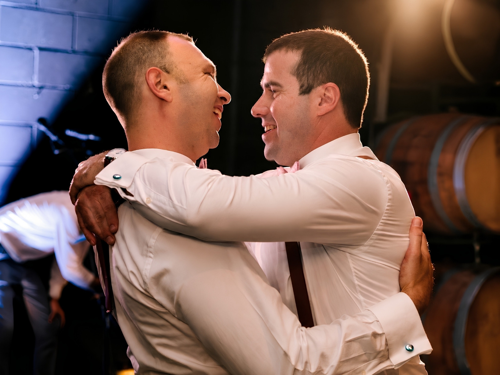 Blair calmly guiding a couple during a private wedding dance session