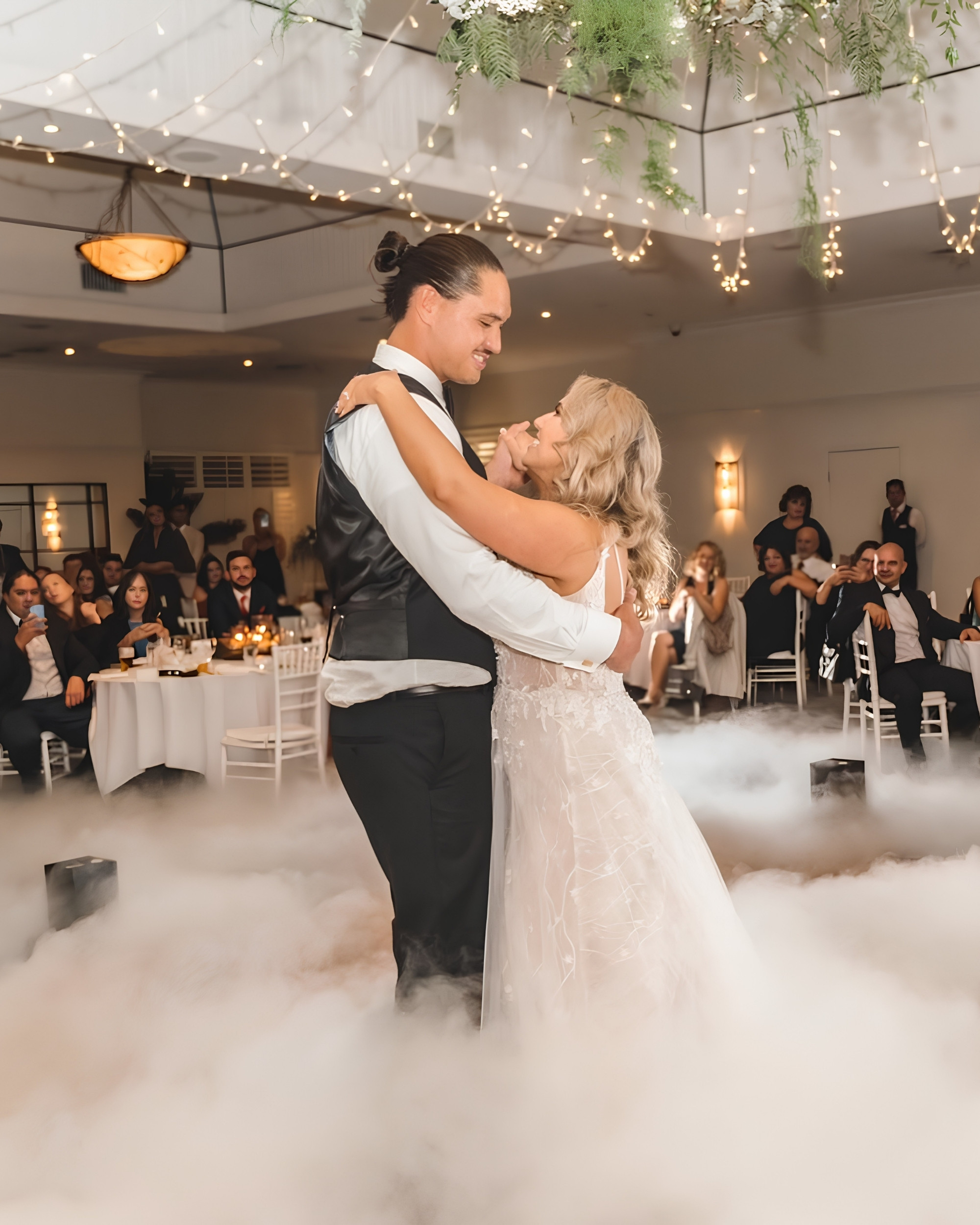 A newlywed couple sharing a connected moment during their first dance
