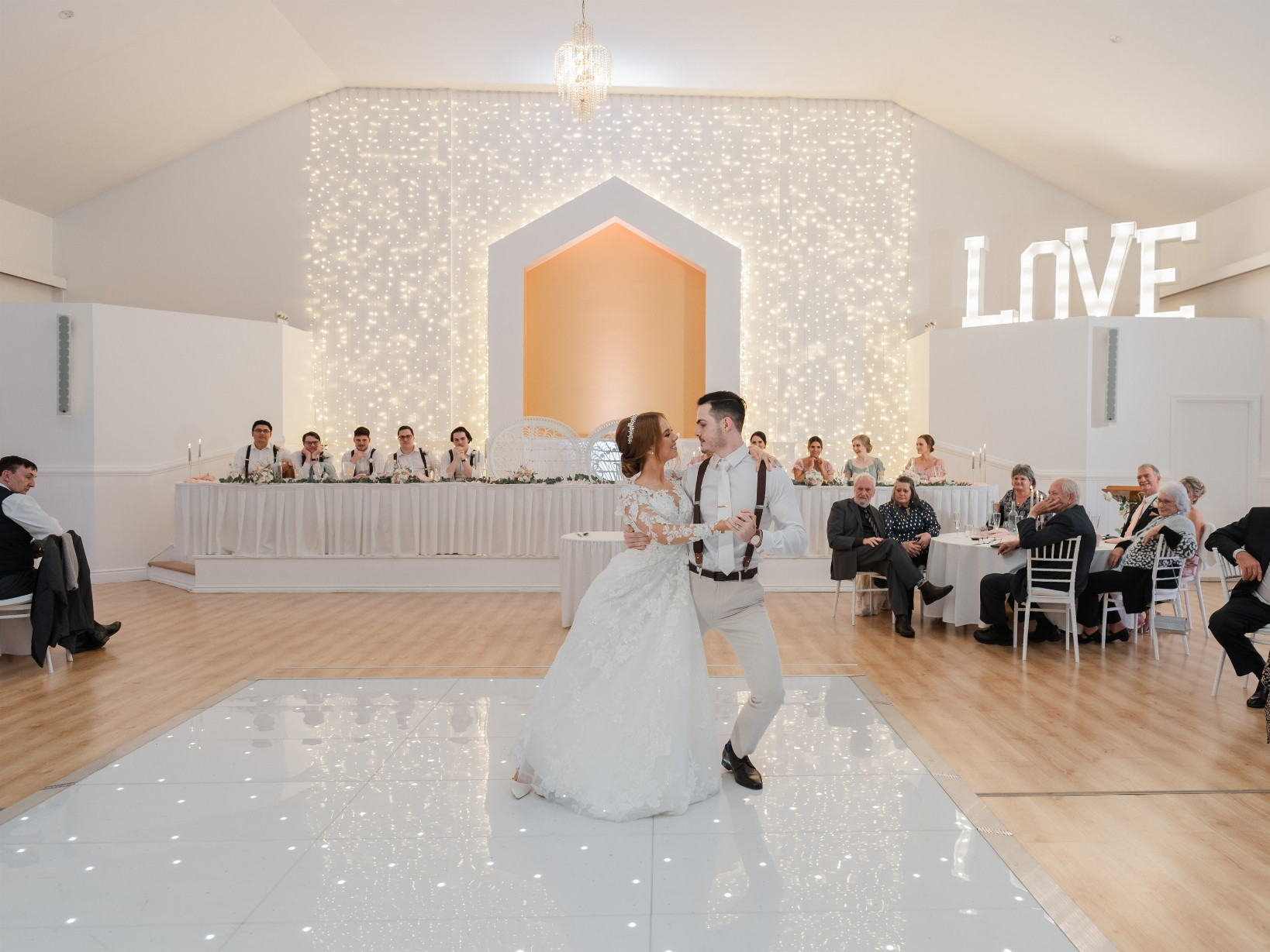 A couple sharing a wedding-day dance moment